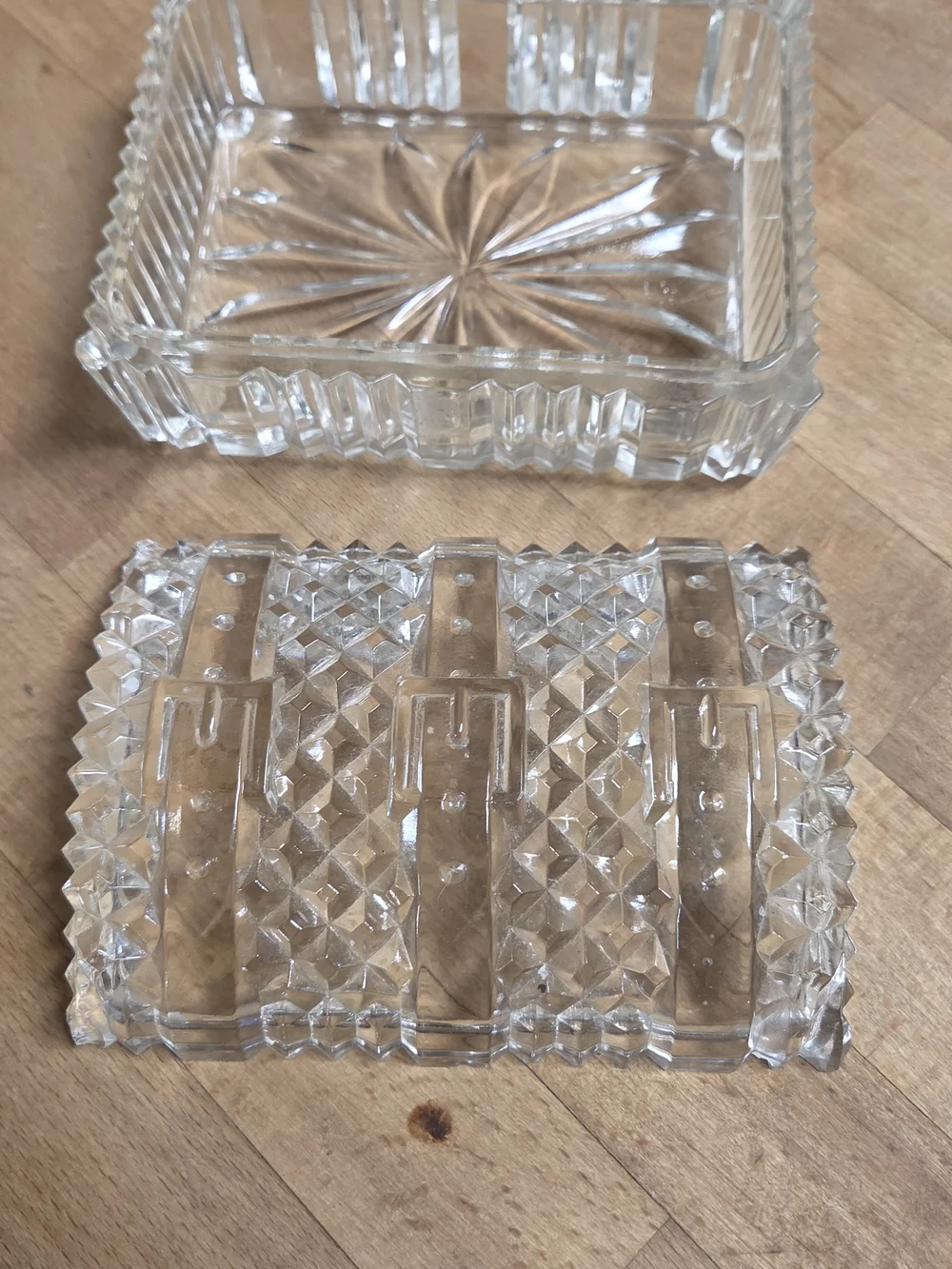 Vintage clear pressed glass trinket box shaped like a miniature treasure chest